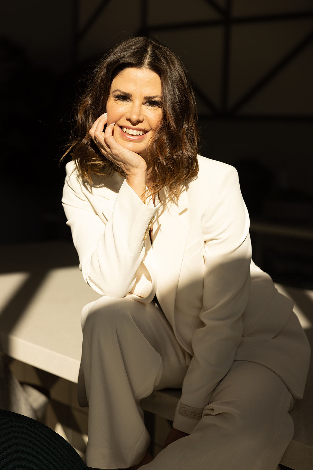 katie-mares-white-suit